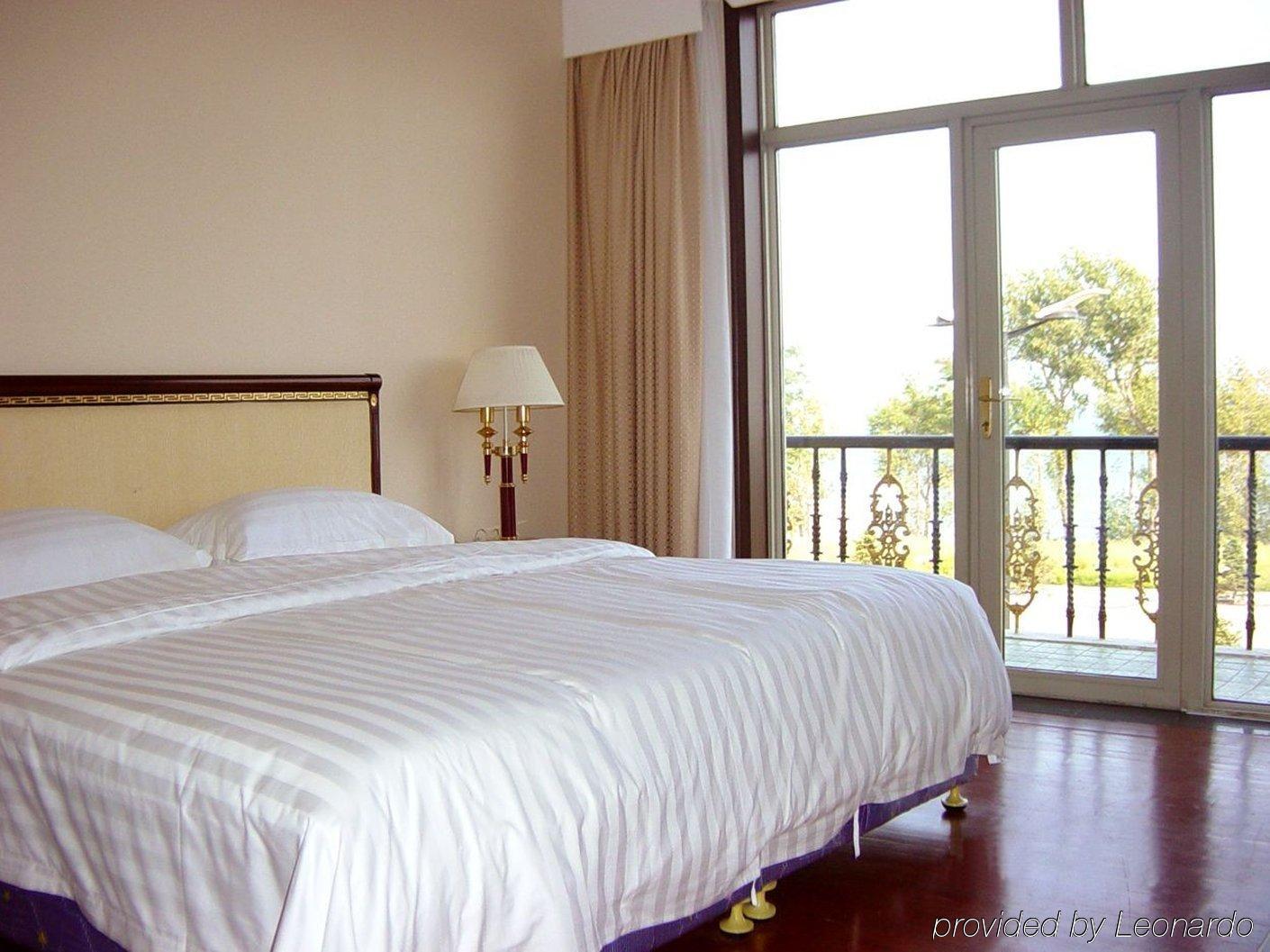 Gloria Holiday Villas Qinhuangdao Habitación foto